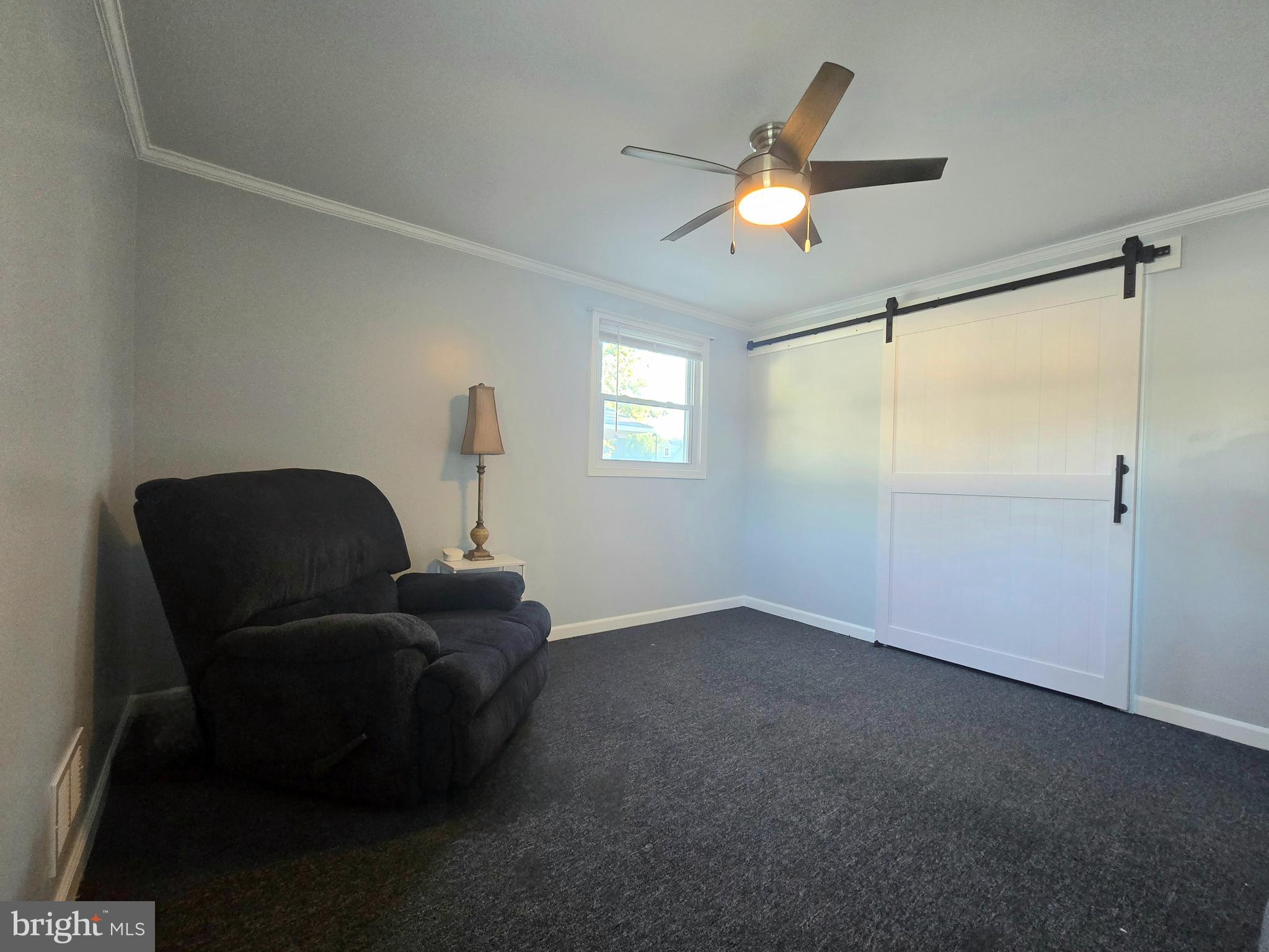 1827 Ridgewick Road Glen Burnie, MD 21061 - Photo 11 of 34 11x11 main level bedroom with sliding barn door