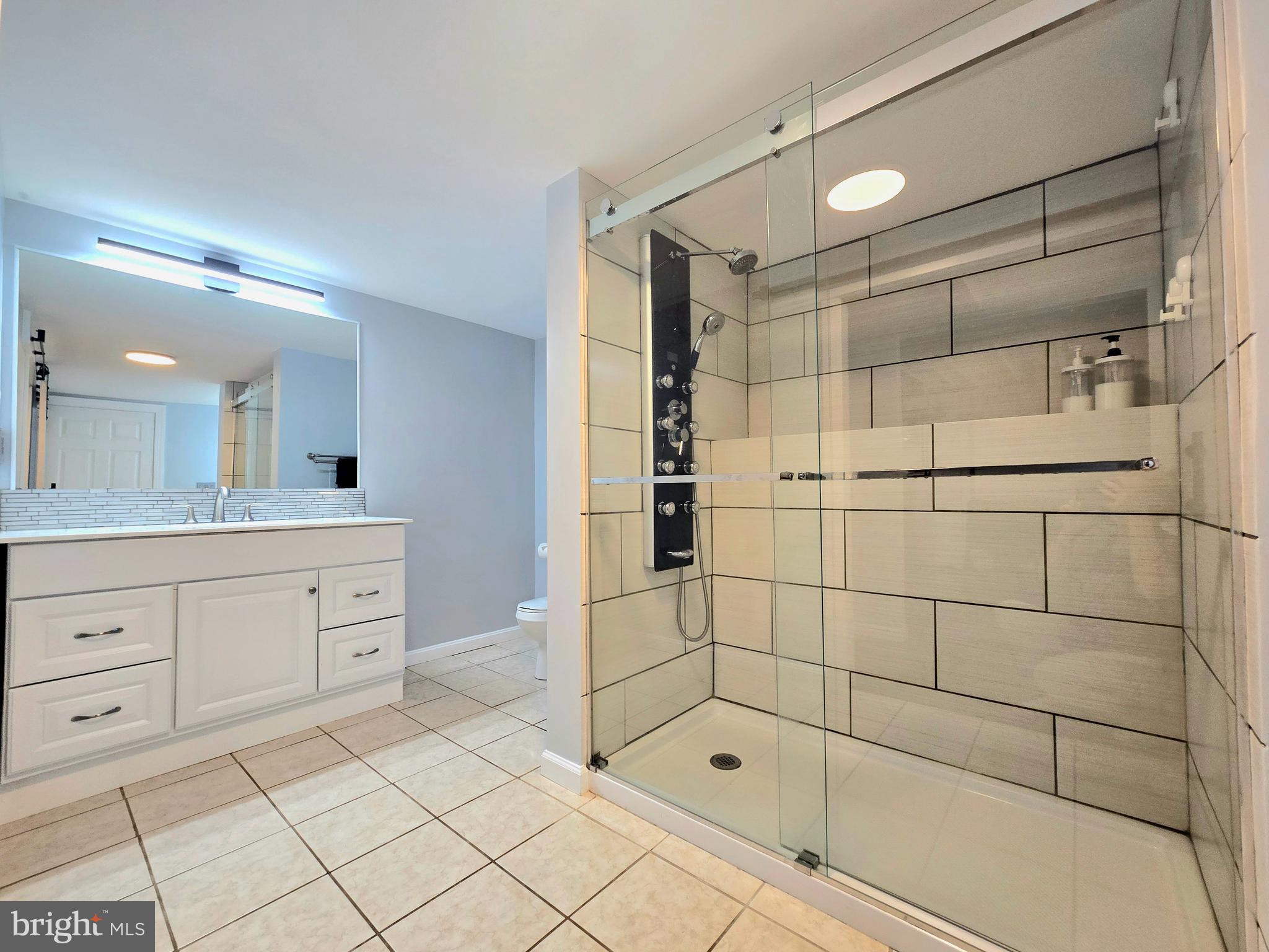 1827 Ridgewick Road Glen Burnie, MD 21061 - Photo 18 of 34 walk in shower with Jet Shower Panel Tower System