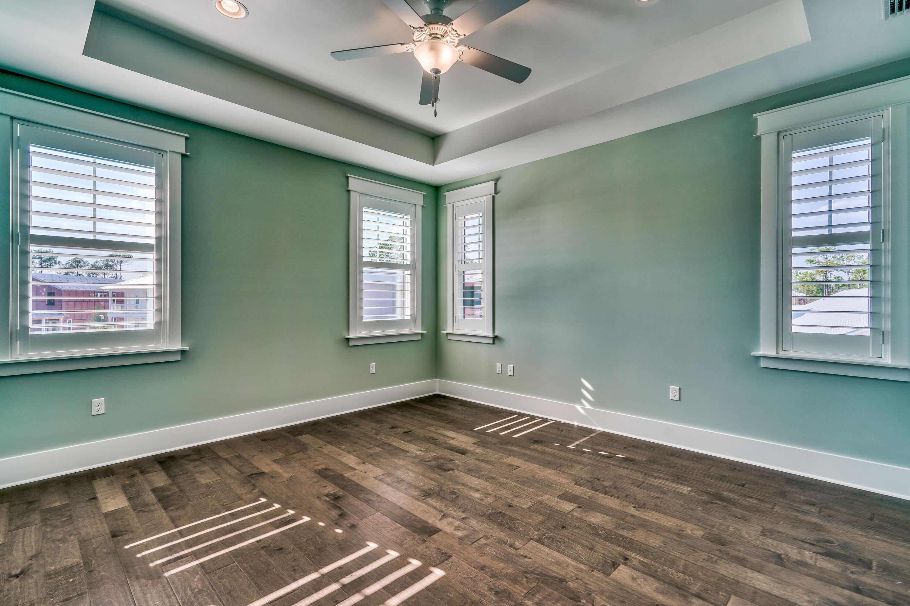 117 Prairie Pass Santa Rosa Beach, FL 32459 - Photo 18 of 26 a view of an empty room with window and chandelier fan