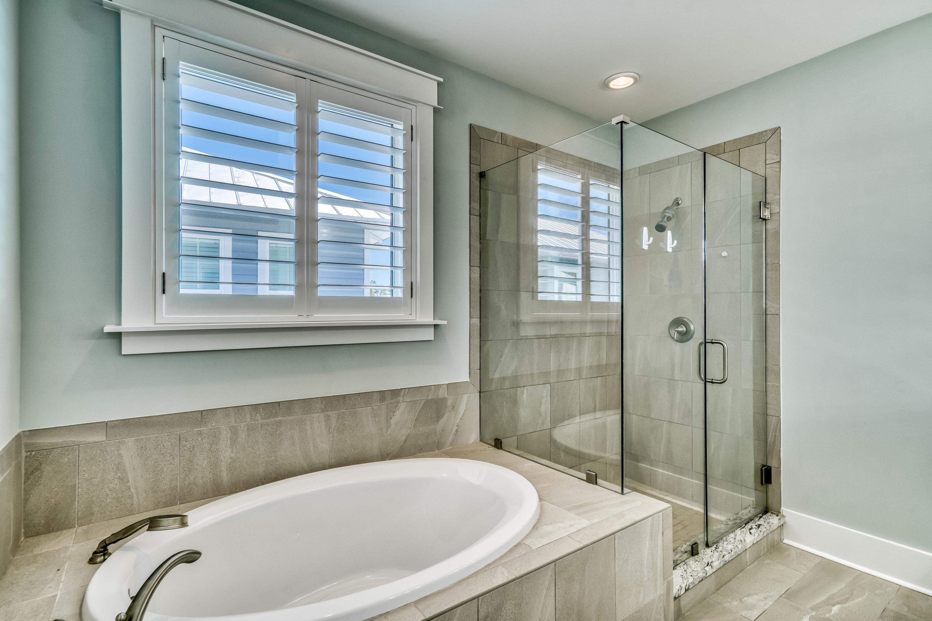 117 Prairie Pass Santa Rosa Beach, FL 32459 - Photo 19 of 26 a bathroom with a bathtub and shower