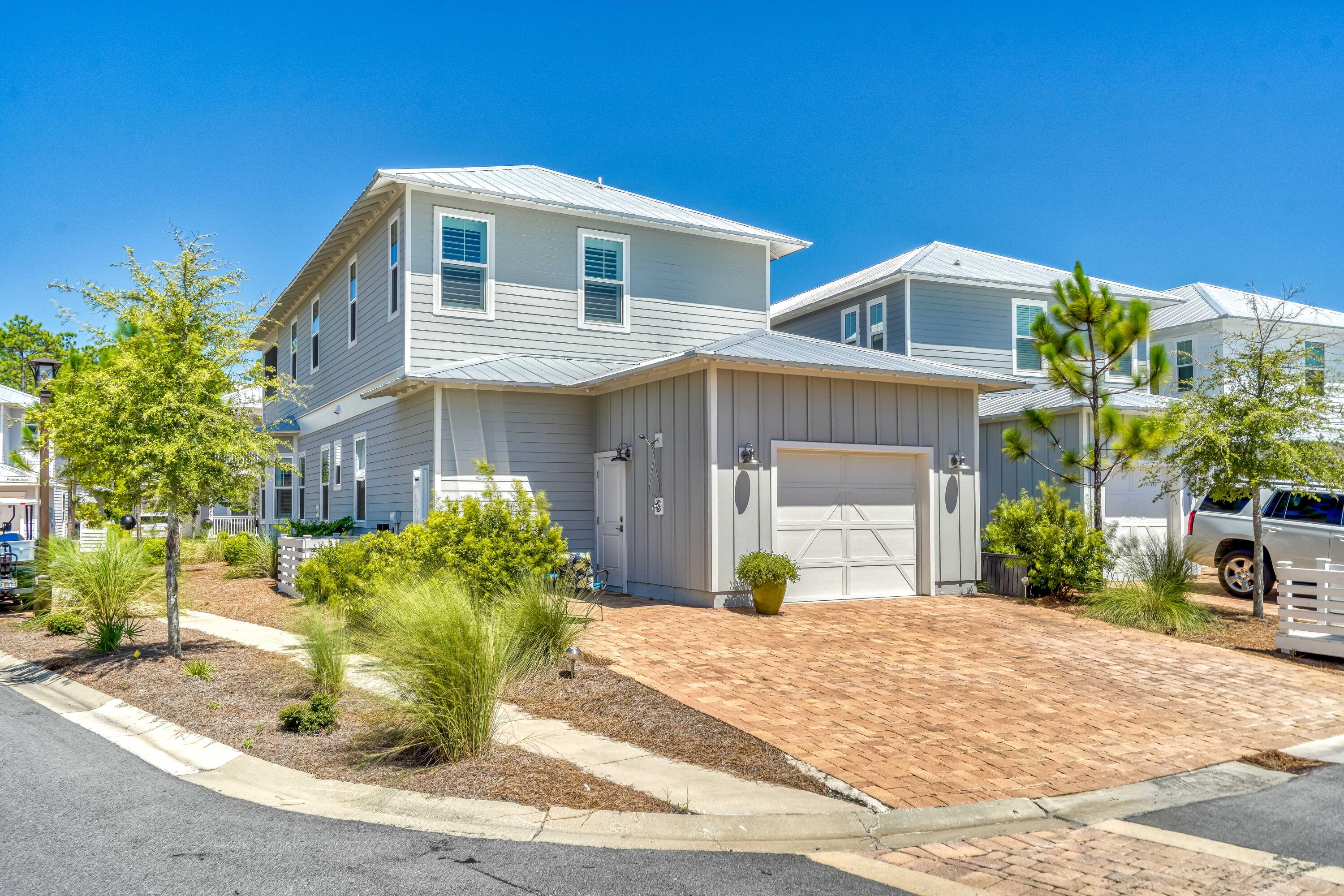 117 Prairie Pass Santa Rosa Beach, FL 32459 - Photo 26 of 26 a front view of a house with a yard