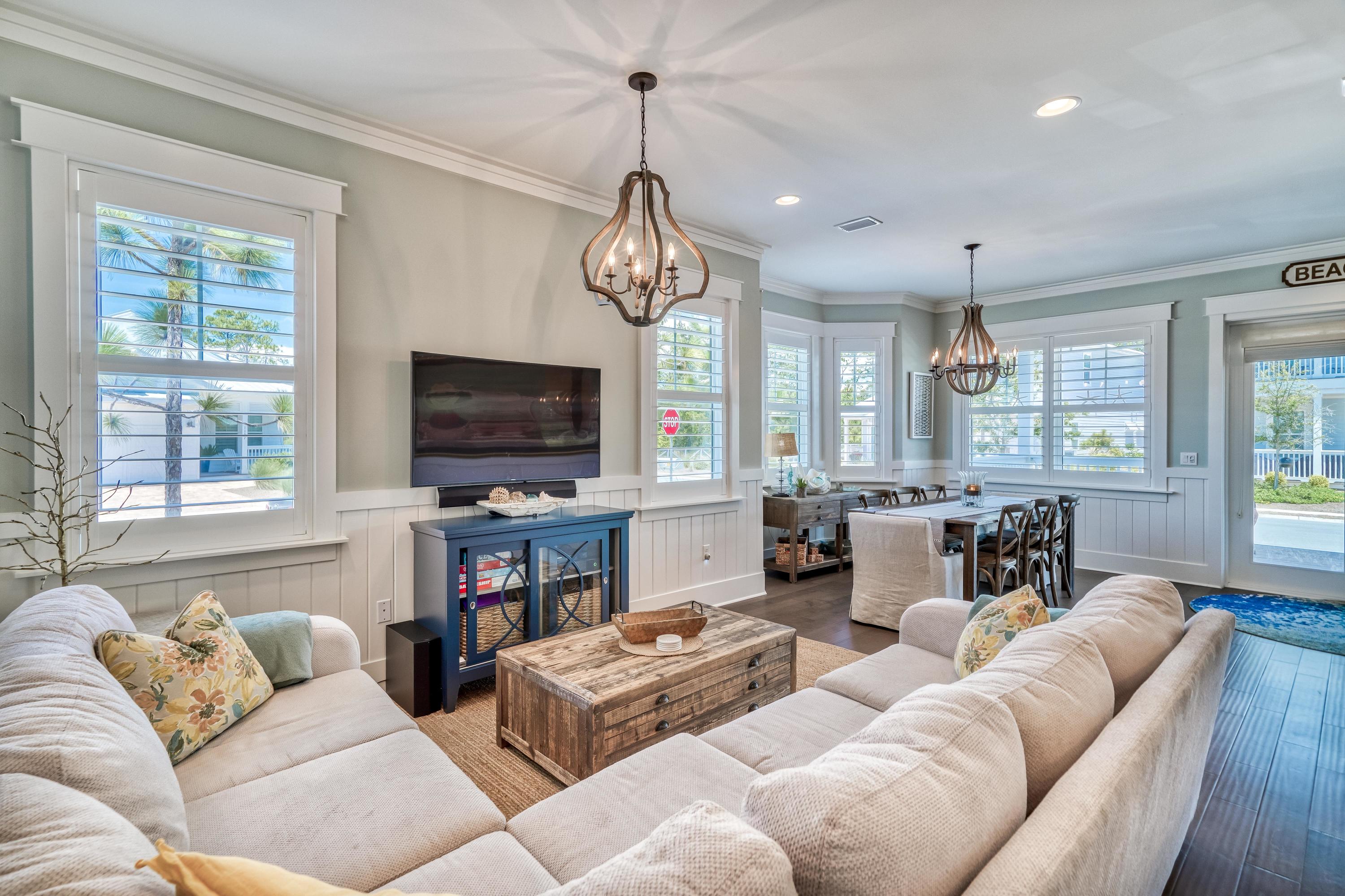 117 Prairie Pass Santa Rosa Beach, FL 32459 - Photo 3 of 26 a living room with fireplace furniture and a flat screen tv