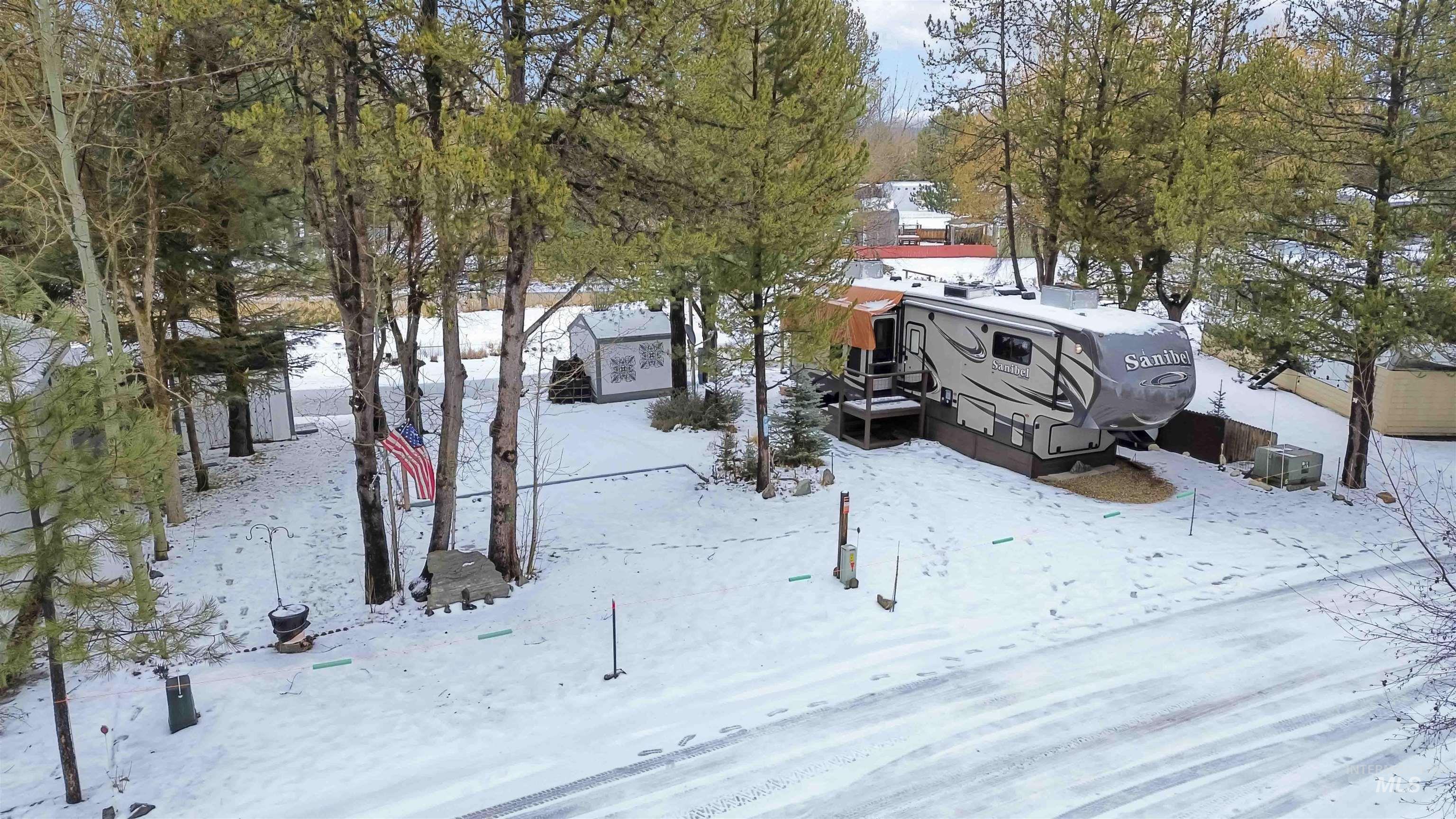 View of yard covered in snow