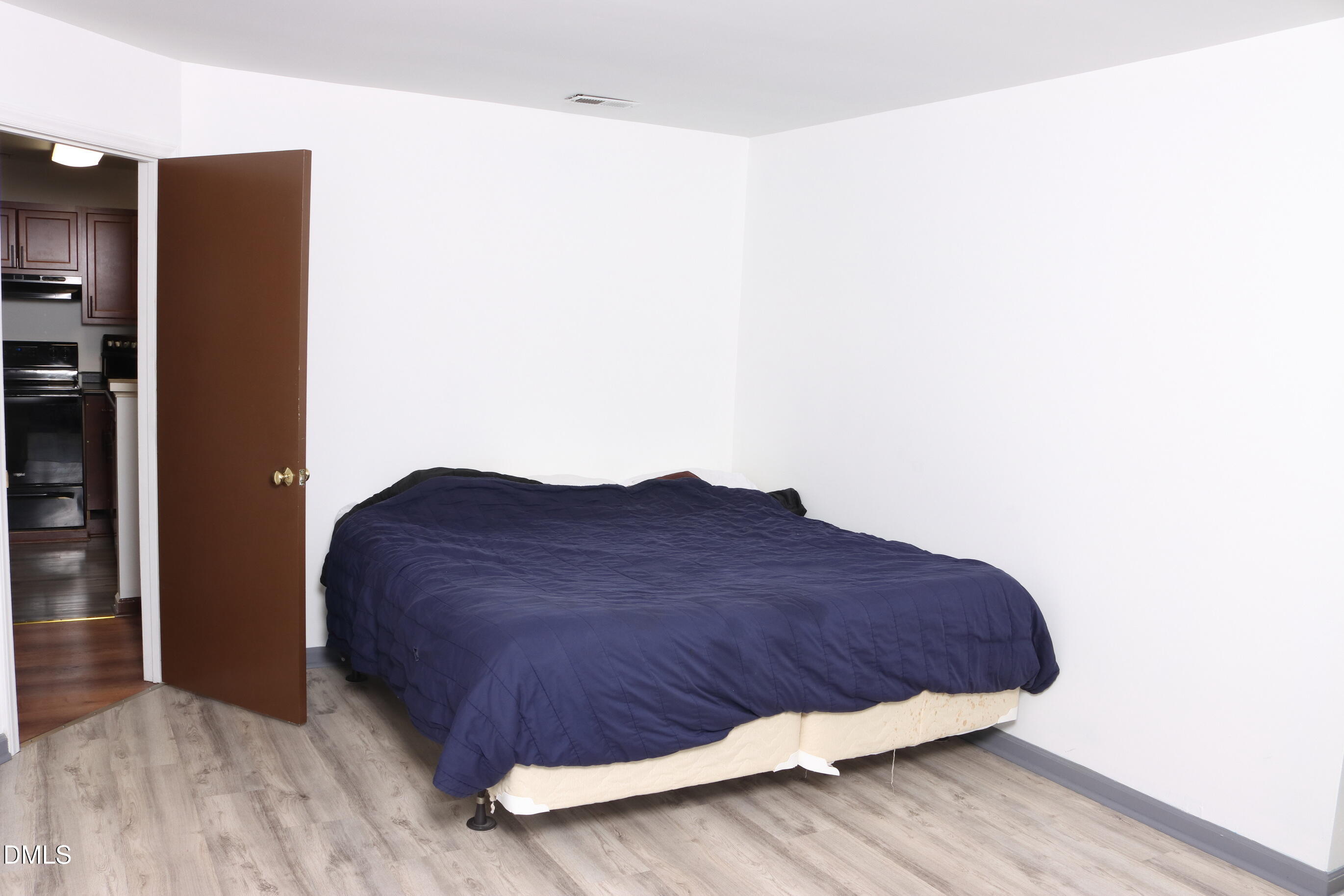 4907 Hollenden Drive, Unit 106 Raleigh, NC 27616 - Photo 13 of 24 Primary Room1