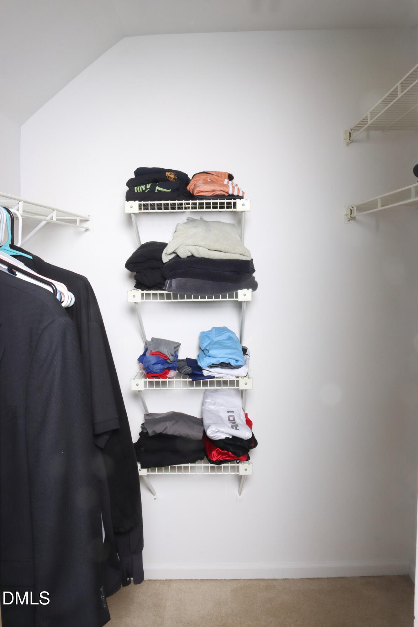 4907 Hollenden Drive, Unit 106 Raleigh, NC 27616 - Photo 15 of 24 Primary Room Walk in Closet
