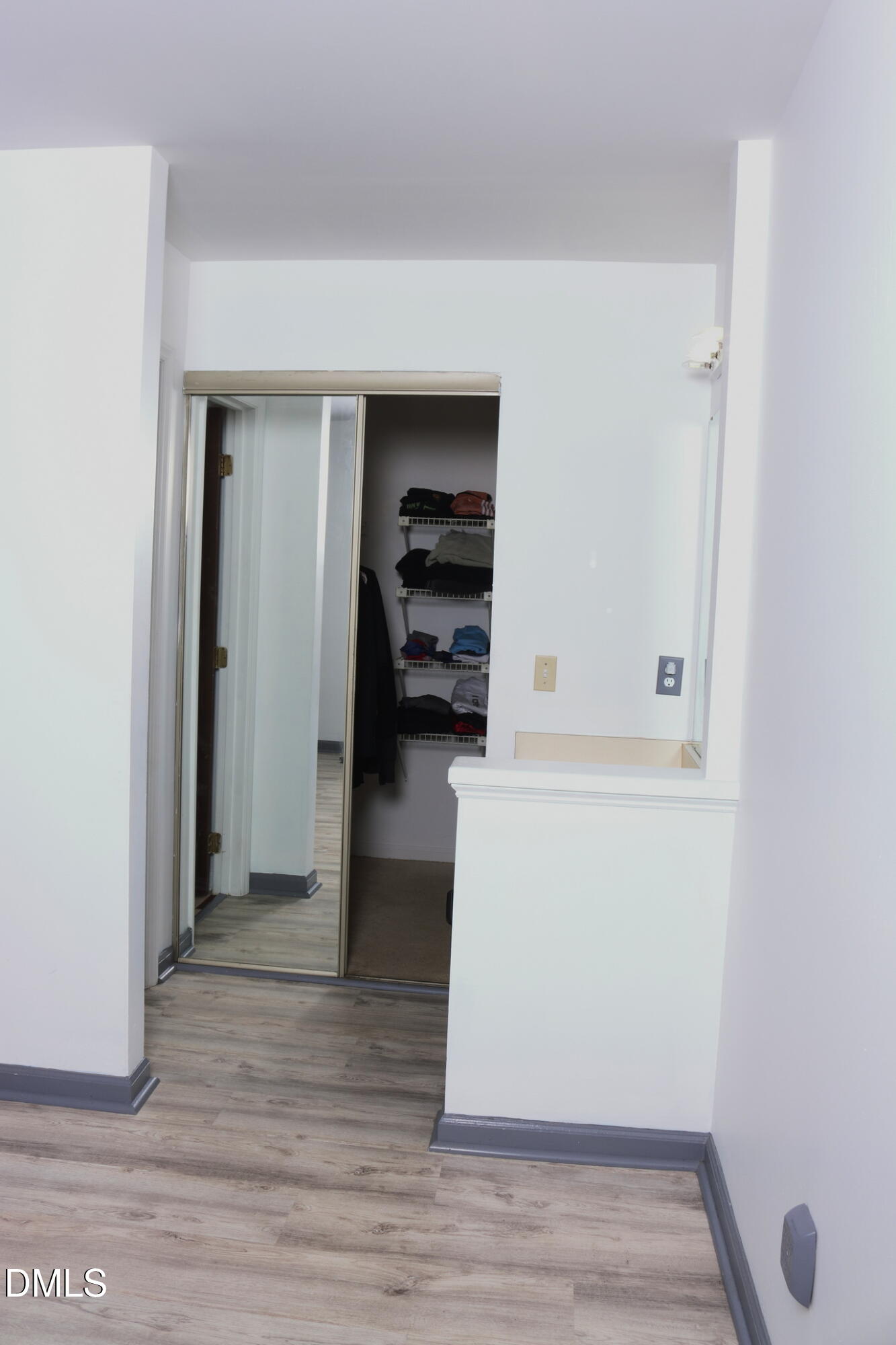 4907 Hollenden Drive, Unit 106 Raleigh, NC 27616 - Photo 16 of 24 Primary Room Walk in Closet1