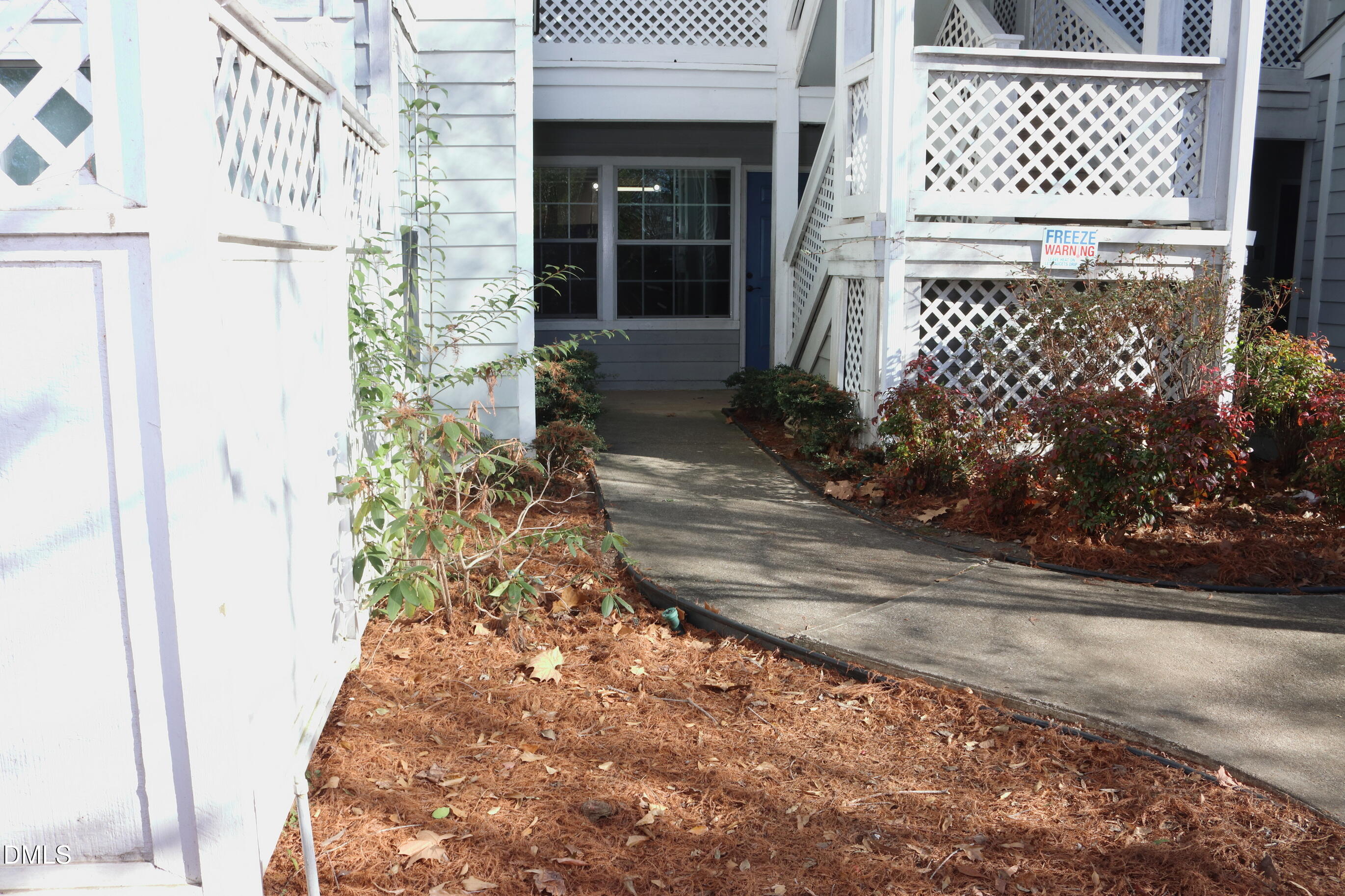 4907 Hollenden Drive, Unit 106 Raleigh, NC 27616 - Photo 3 of 24 Entrance Walk Way