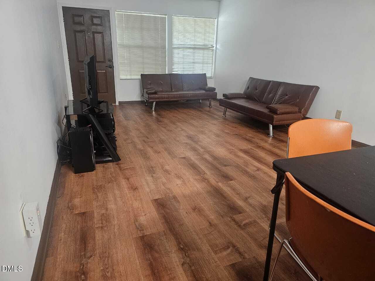 4907 Hollenden Drive, Unit 106 Raleigh, NC 27616 - Photo 5 of 24 4907 Living Room2