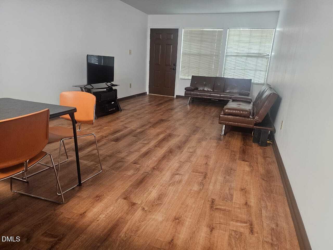4907 Hollenden Drive, Unit 106 Raleigh, NC 27616 - Photo 6 of 24 4907 Living Room3