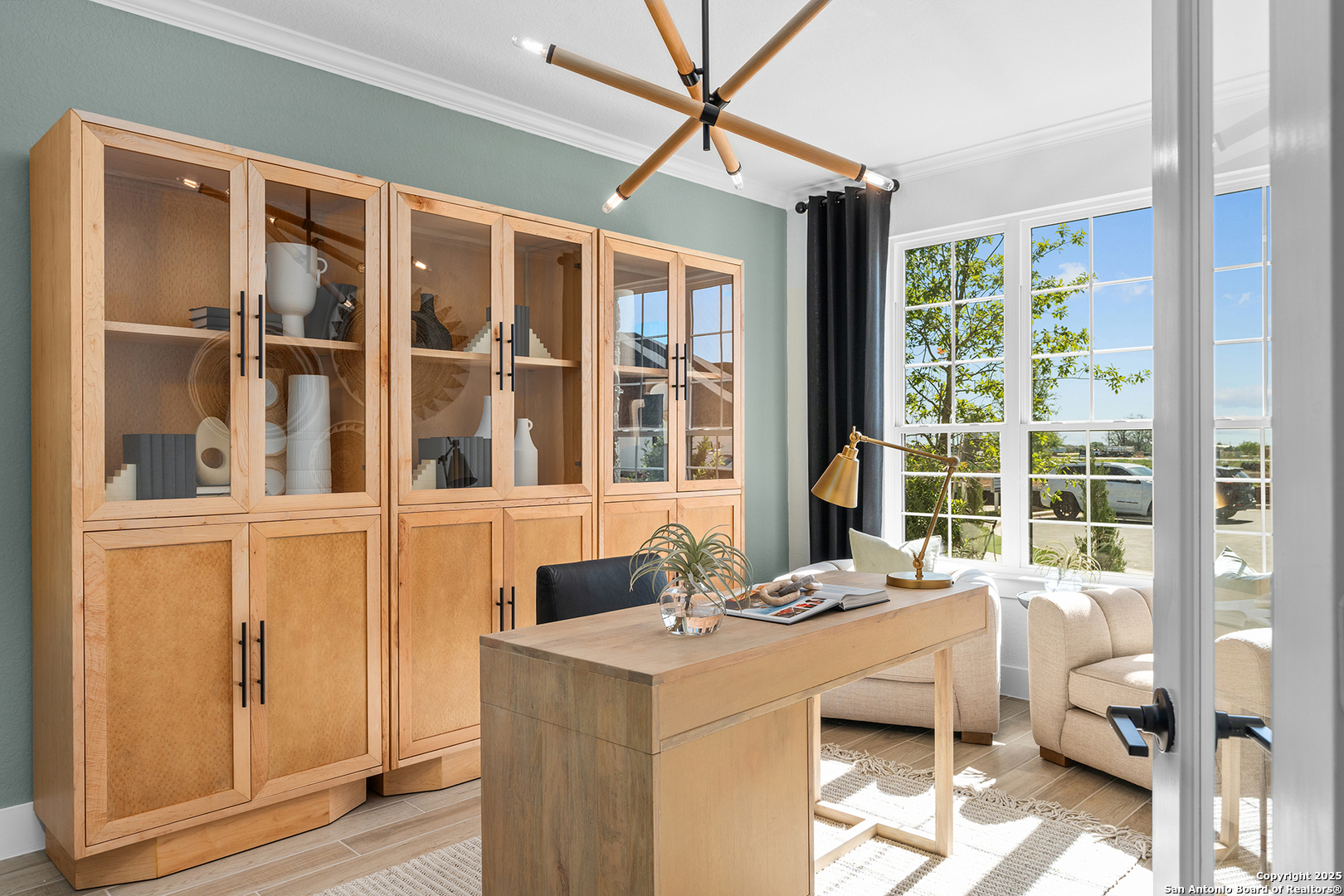 205 Farming Grove Boerne, TX 78006 - Photo 16 of 27 a dining room with a large window and couch