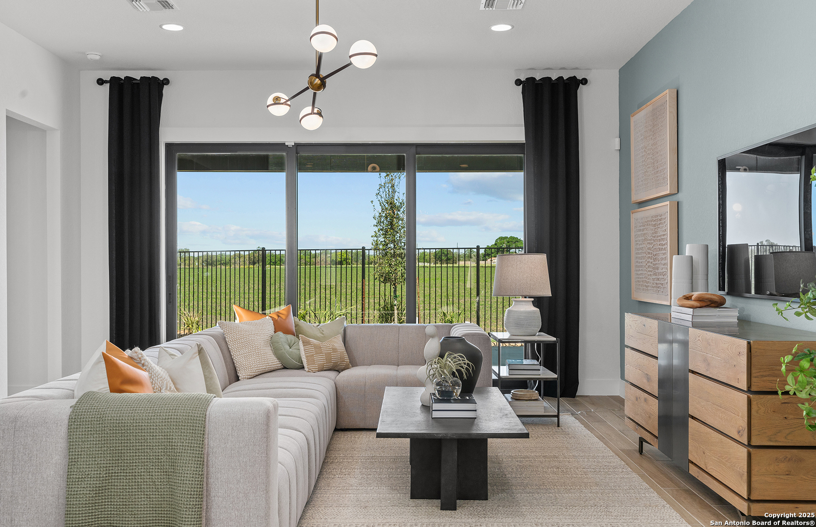 205 Farming Grove Boerne, TX 78006 - Photo 6 of 27 a living room with furniture and a large window