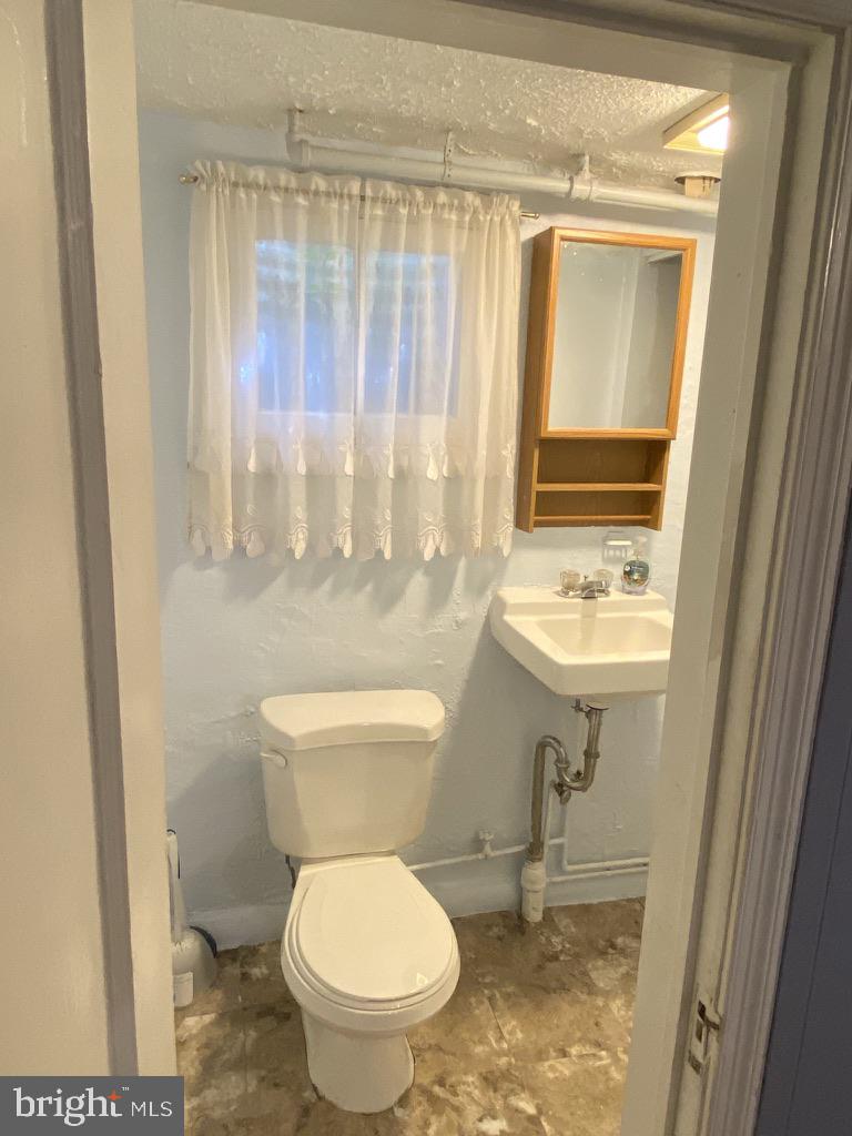 246 Ridge Avenue Towson, MD 21286 - Photo 7 of 28 Basement 1/2 bath