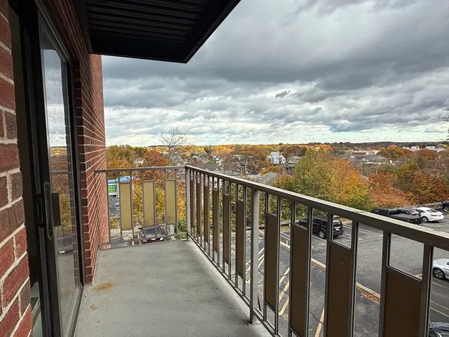 a view of a balcony with city view