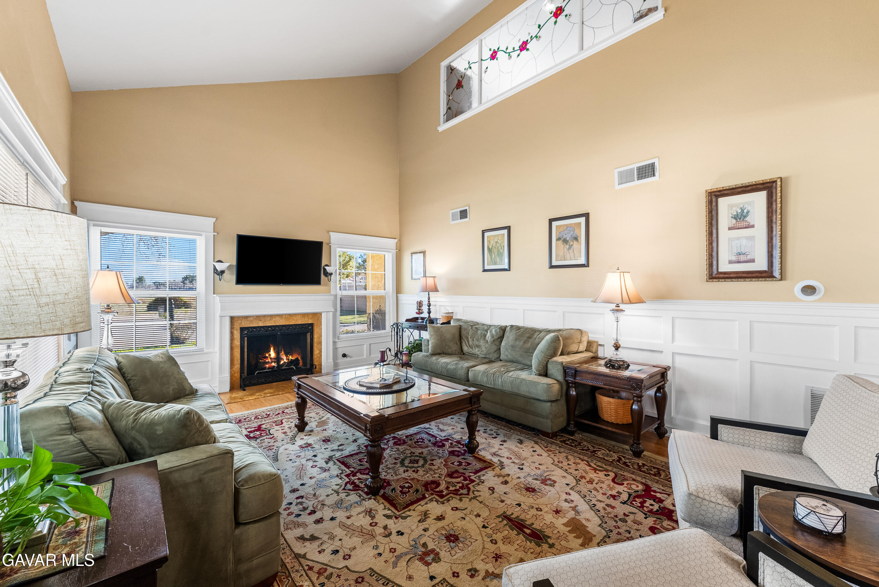 44003 7th Street East Lancaster, CA 93535 - Photo 11 of 62 a living room with furniture and a fireplace