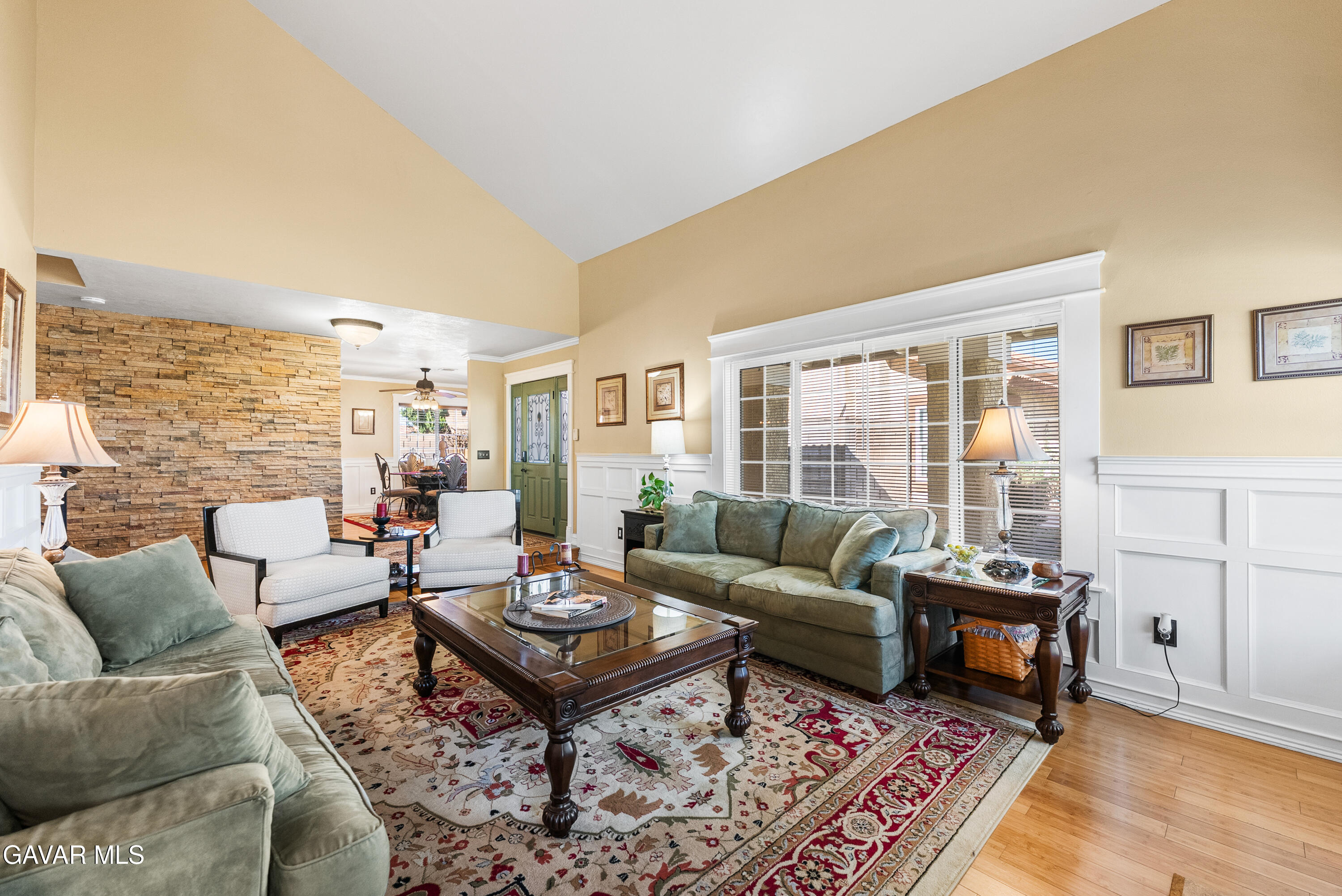 44003 7th Street East Lancaster, CA 93535 - Photo 12 of 62 a living room with furniture and a large window