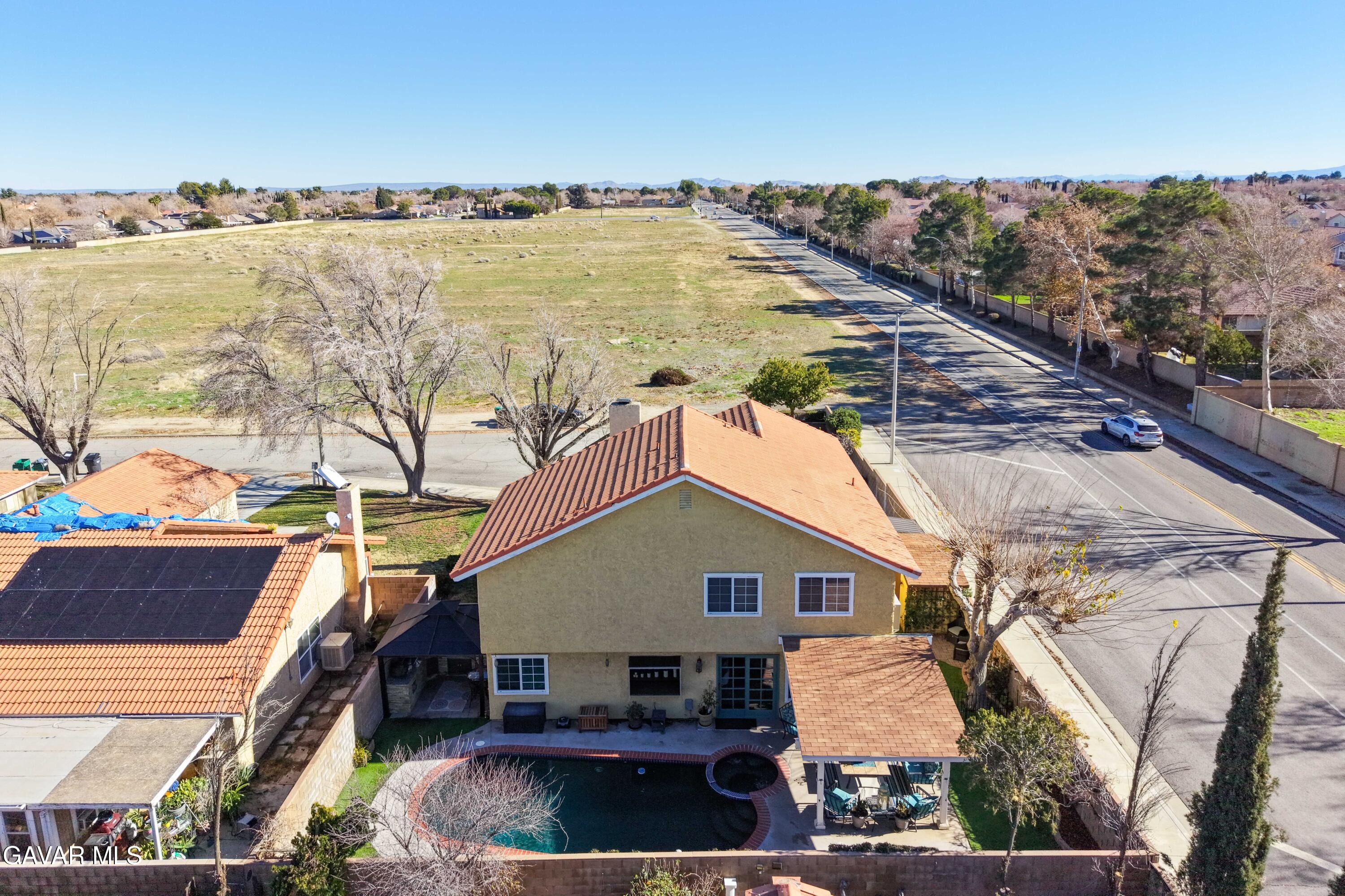 44003 7th Street East Lancaster, CA 93535 - Photo 13 of 62 a aerial view of a house with a ocean view