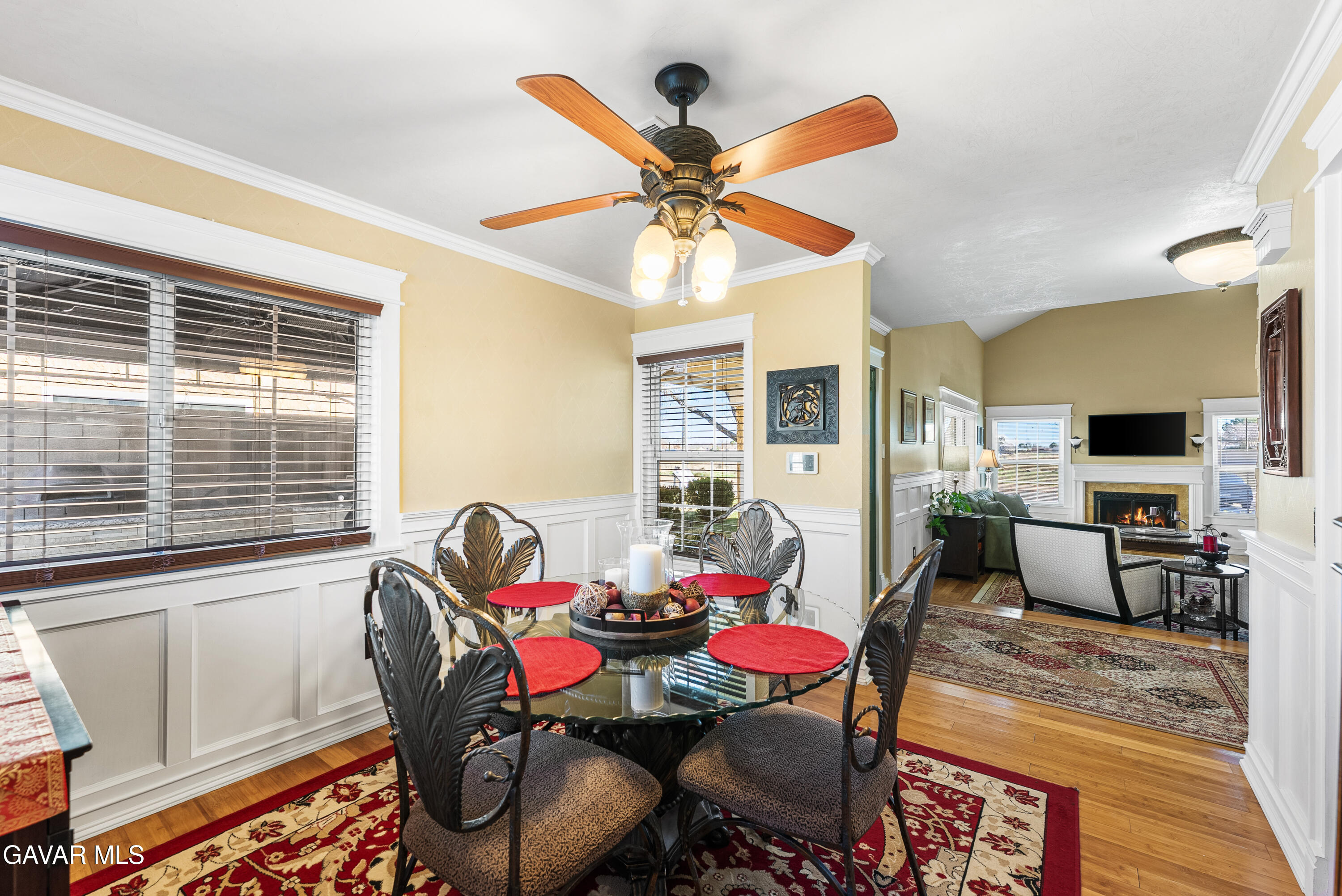 44003 7th Street East Lancaster, CA 93535 - Photo 17 of 62 a view of a dining room with furniture window and wooden floor