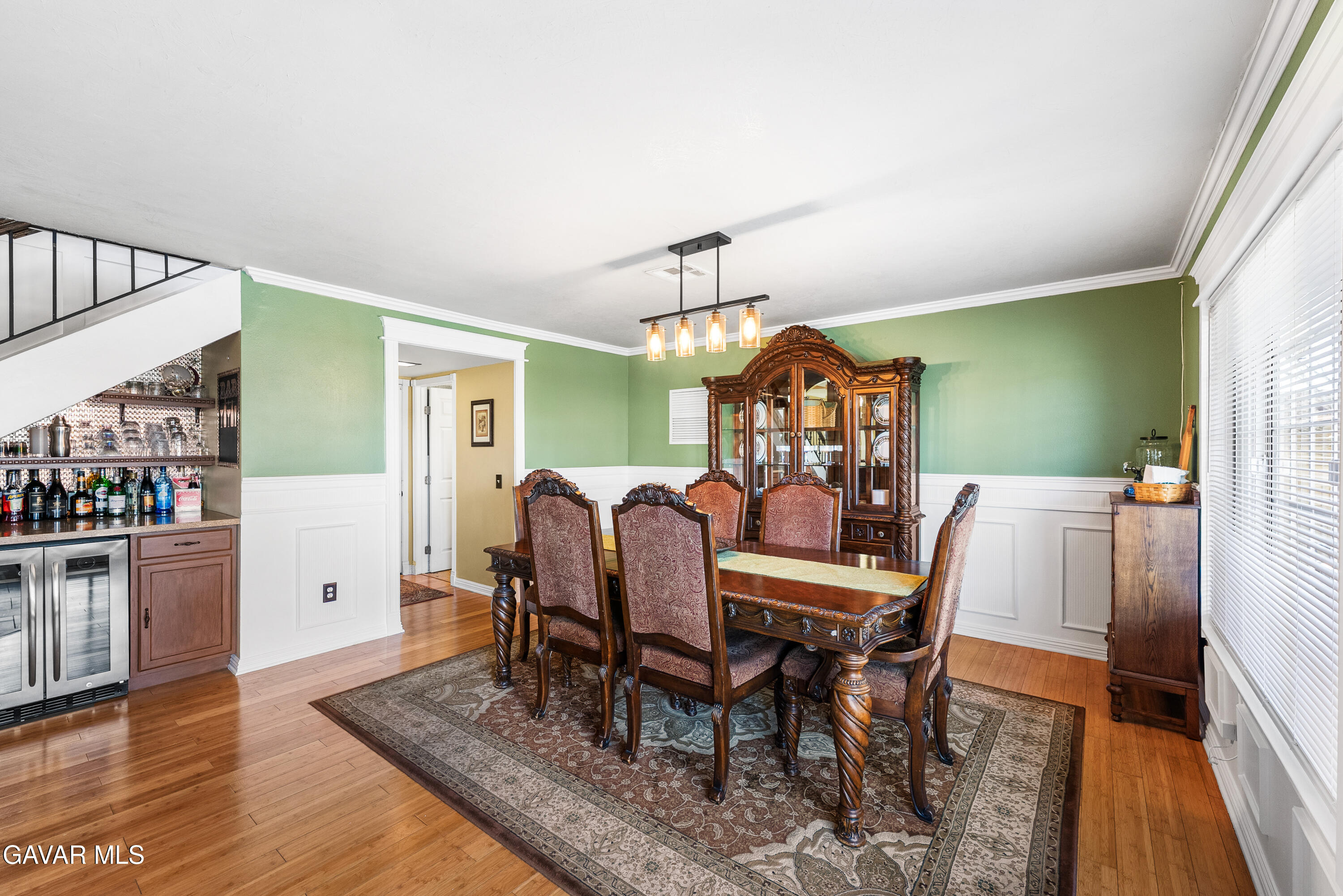 44003 7th Street East Lancaster, CA 93535 - Photo 20 of 62 a view of a dining room with furniture and wooden floor