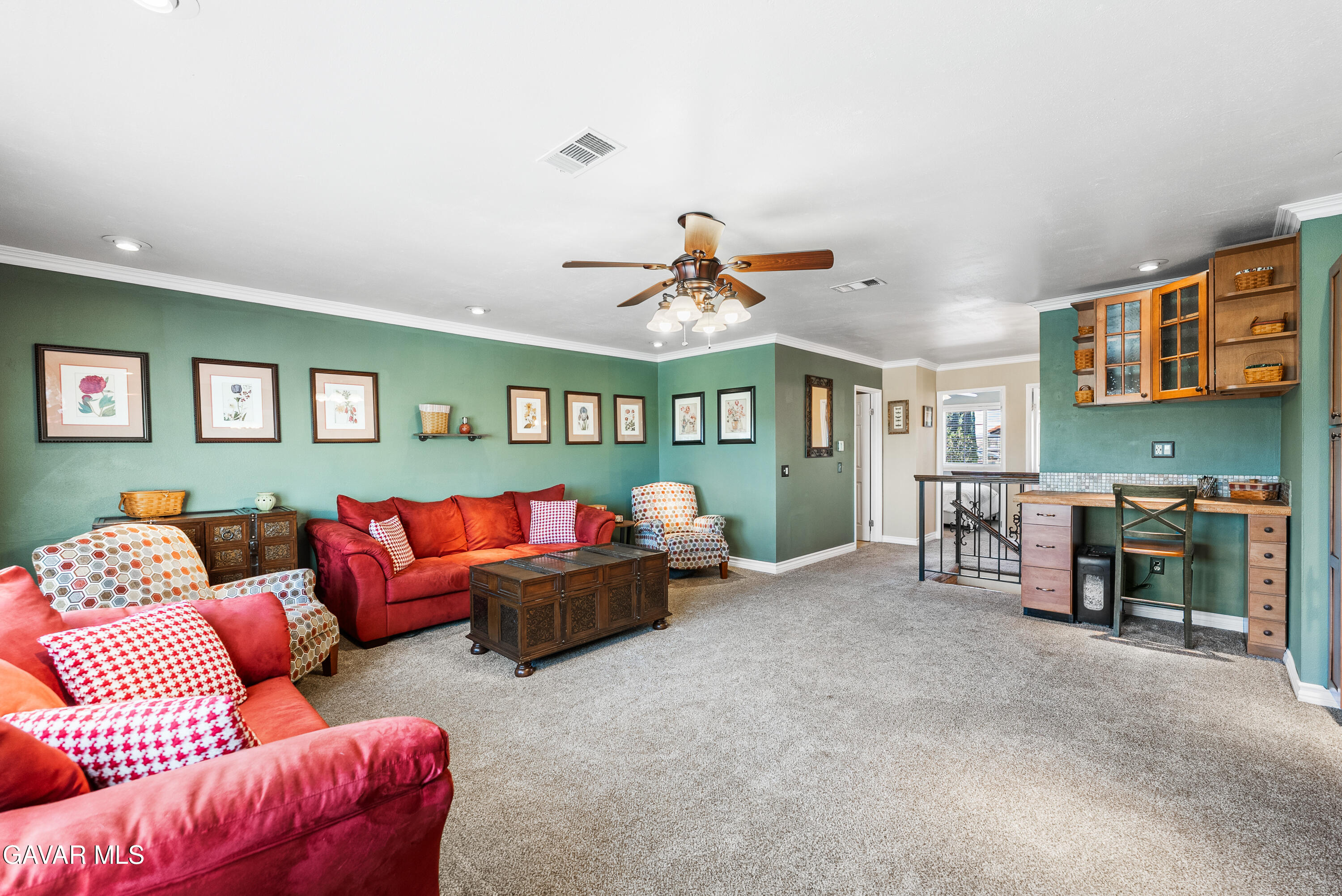 44003 7th Street East Lancaster, CA 93535 - Photo 30 of 62 a living room with furniture and a table