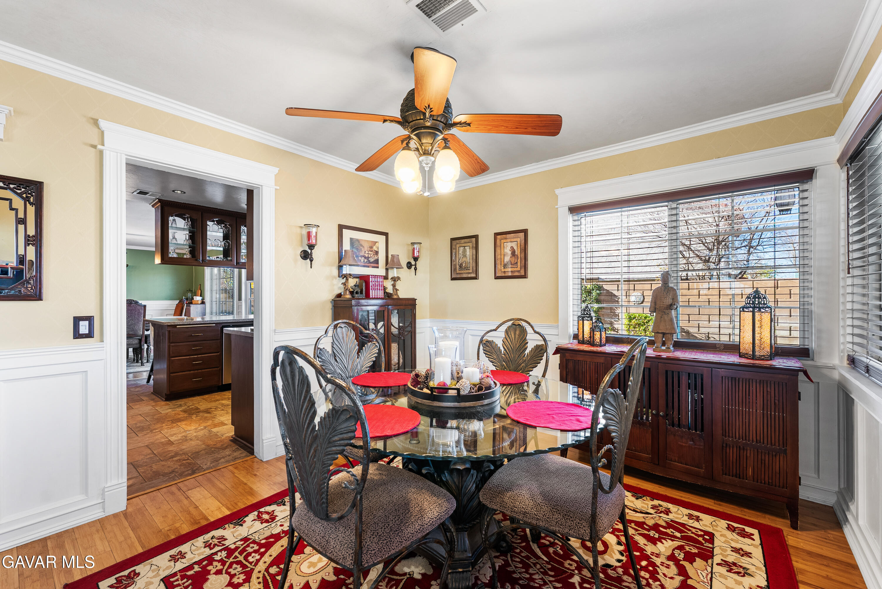 44003 7th Street East Lancaster, CA 93535 - Photo 30 of 62 a view of a dining room with furniture window and wooden floor