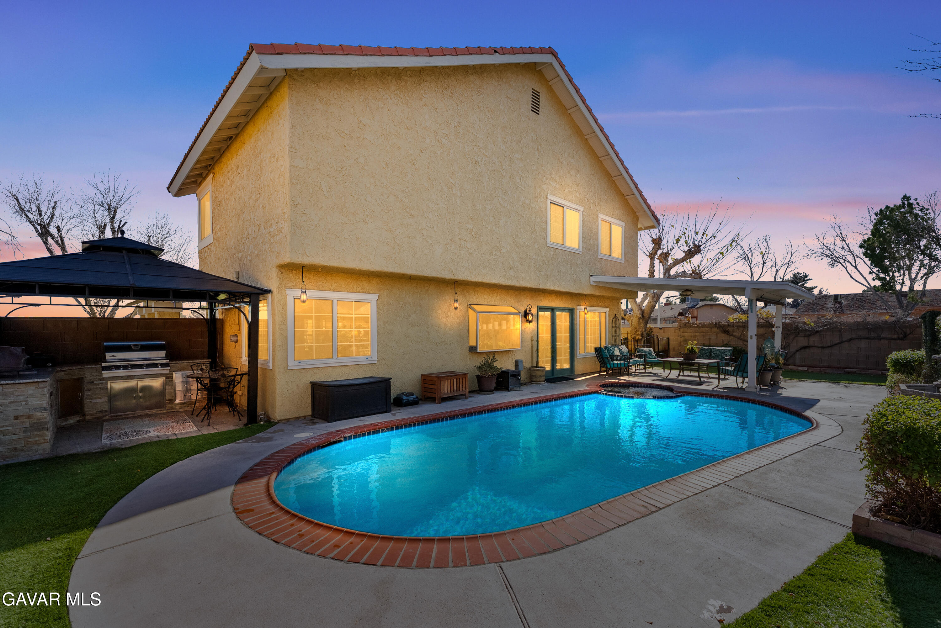 44003 7th Street East Lancaster, CA 93535 - Photo 3 of 62 a view of a swimming pool with a patio