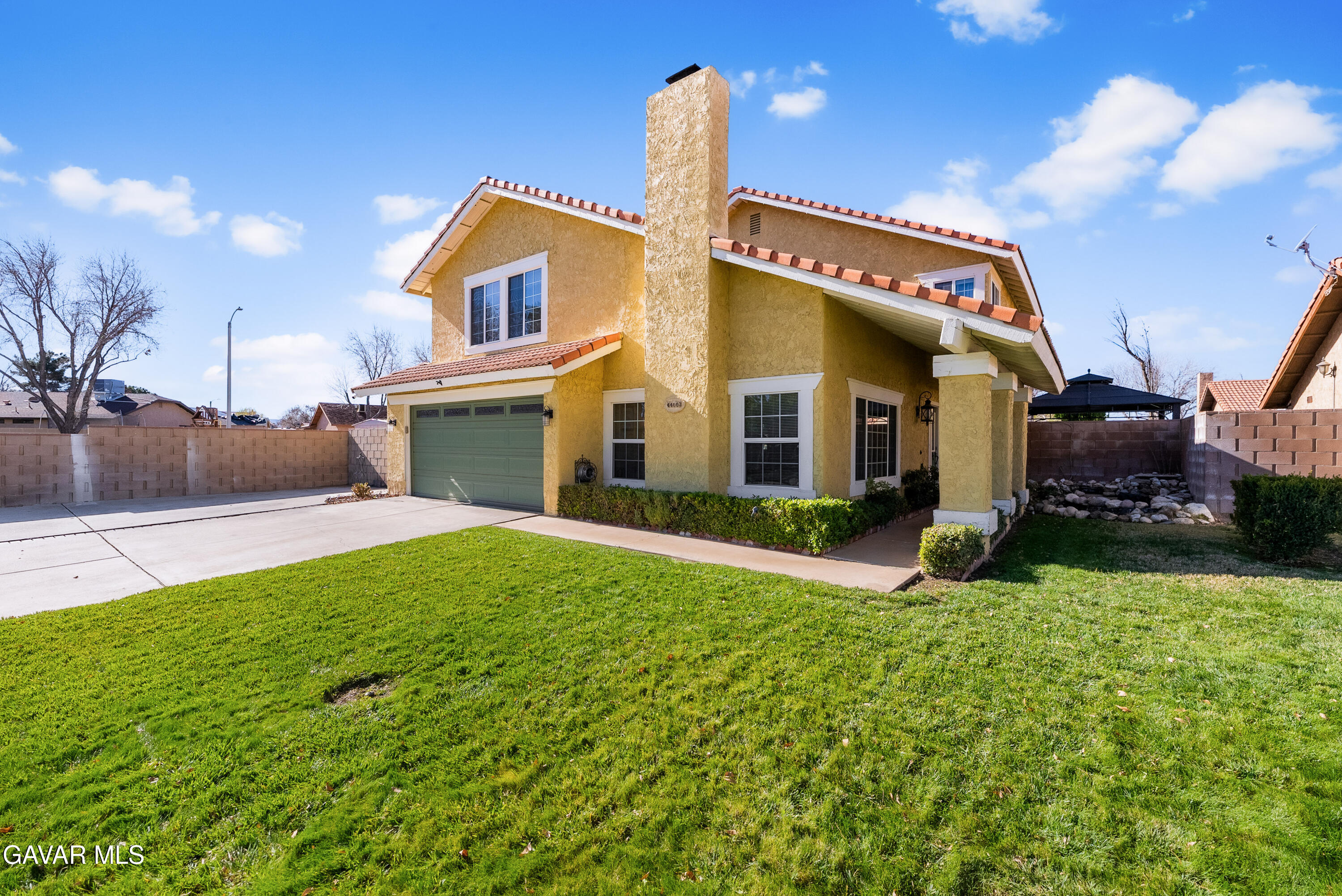 44003 7th Street East Lancaster, CA 93535 - Photo 4 of 62 a view of a house with a yard