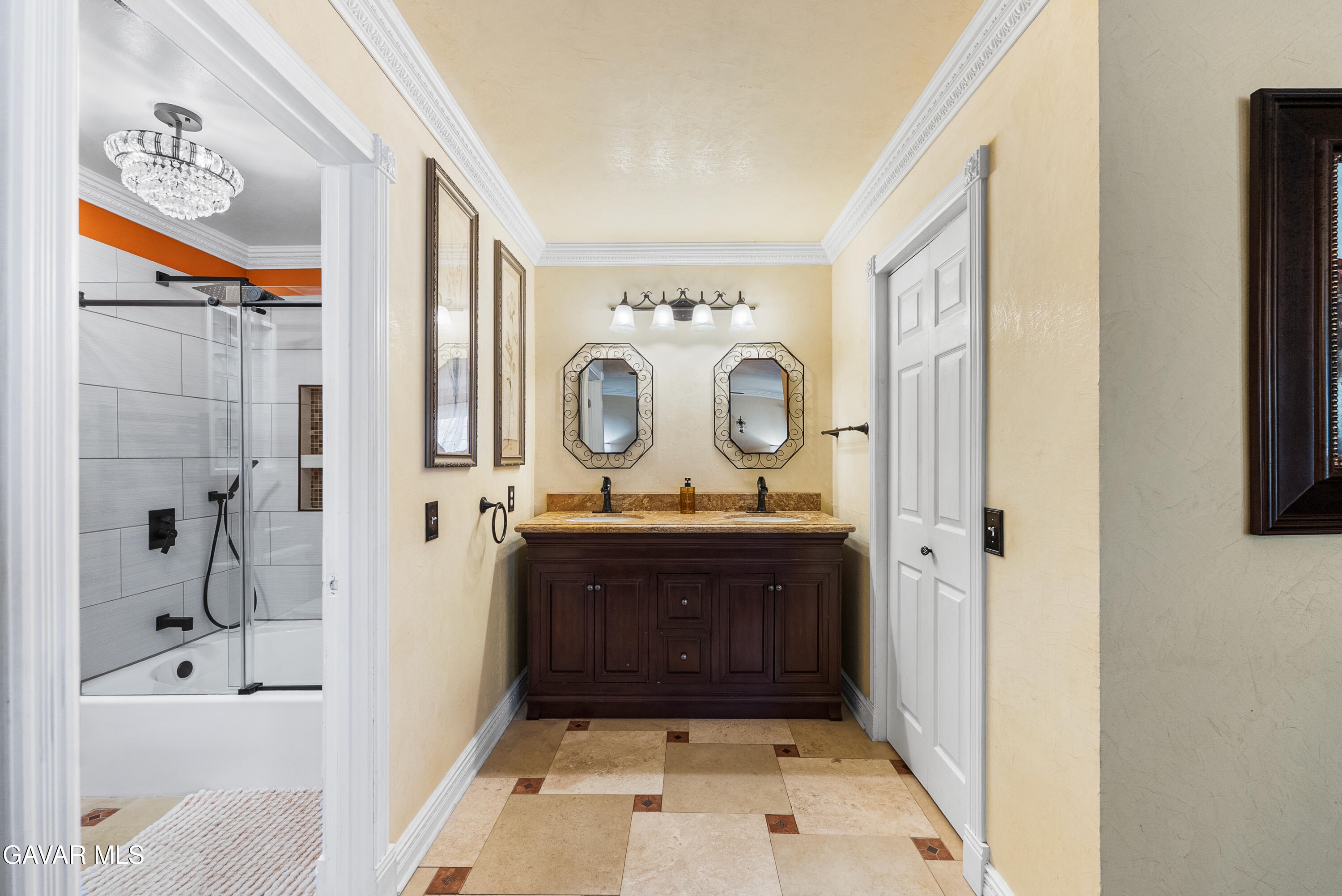 44003 7th Street East Lancaster, CA 93535 - Photo 42 of 62 a bathroom with a bathtub and a shower
