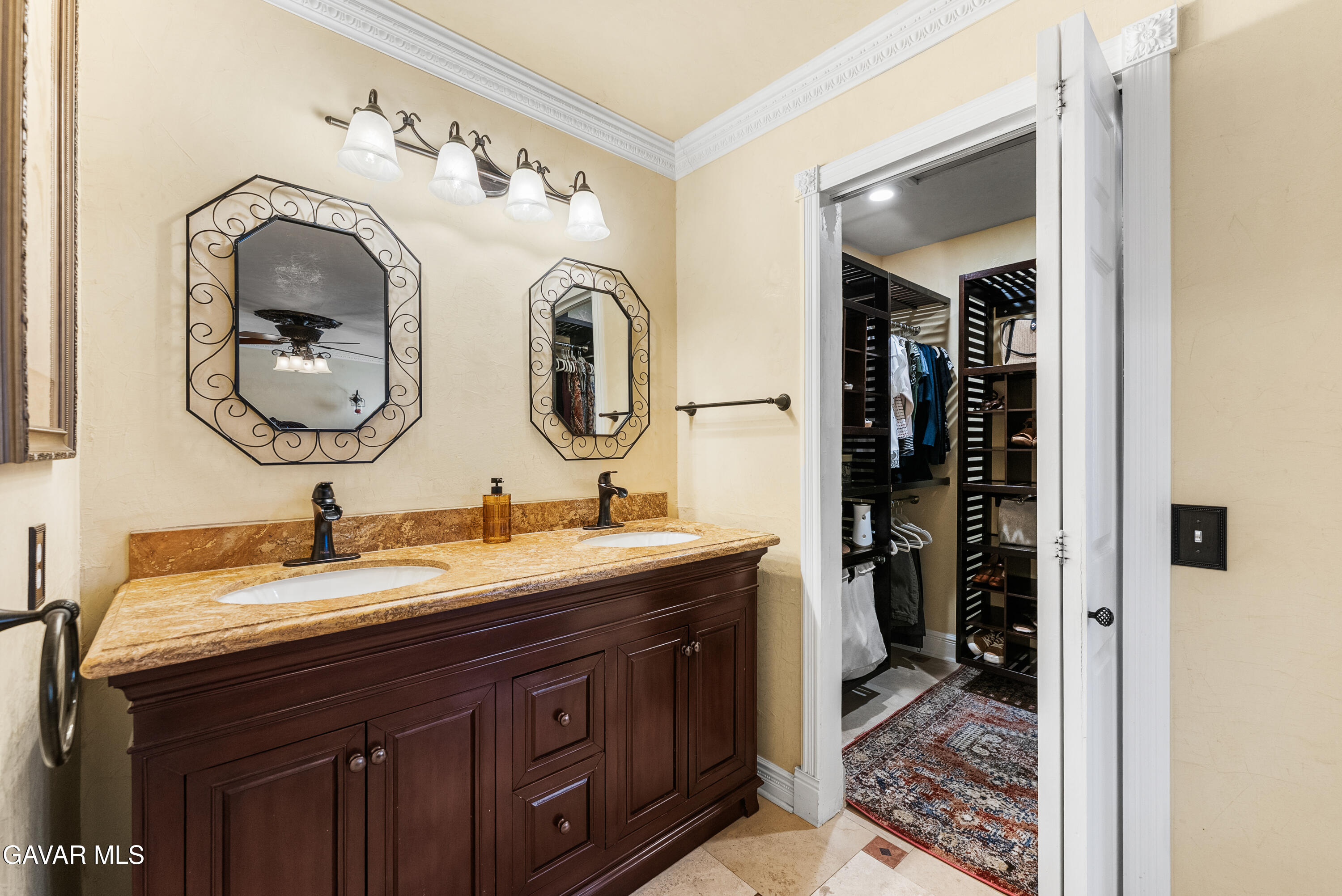 44003 7th Street East Lancaster, CA 93535 - Photo 44 of 62 a bathroom with a sink and a mirror