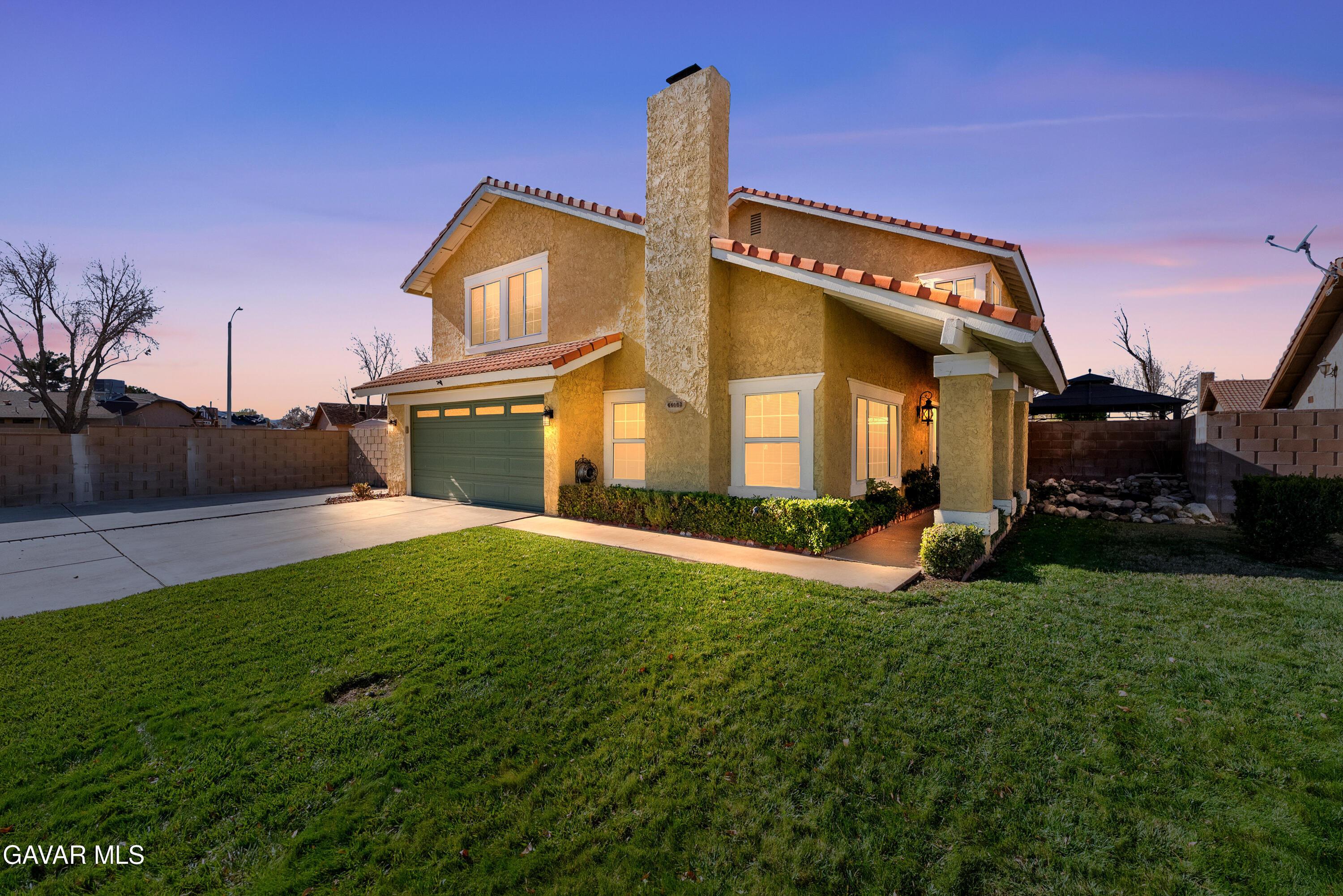 44003 7th Street East Lancaster, CA 93535 - Photo 5 of 62 a view of a house with a backyard