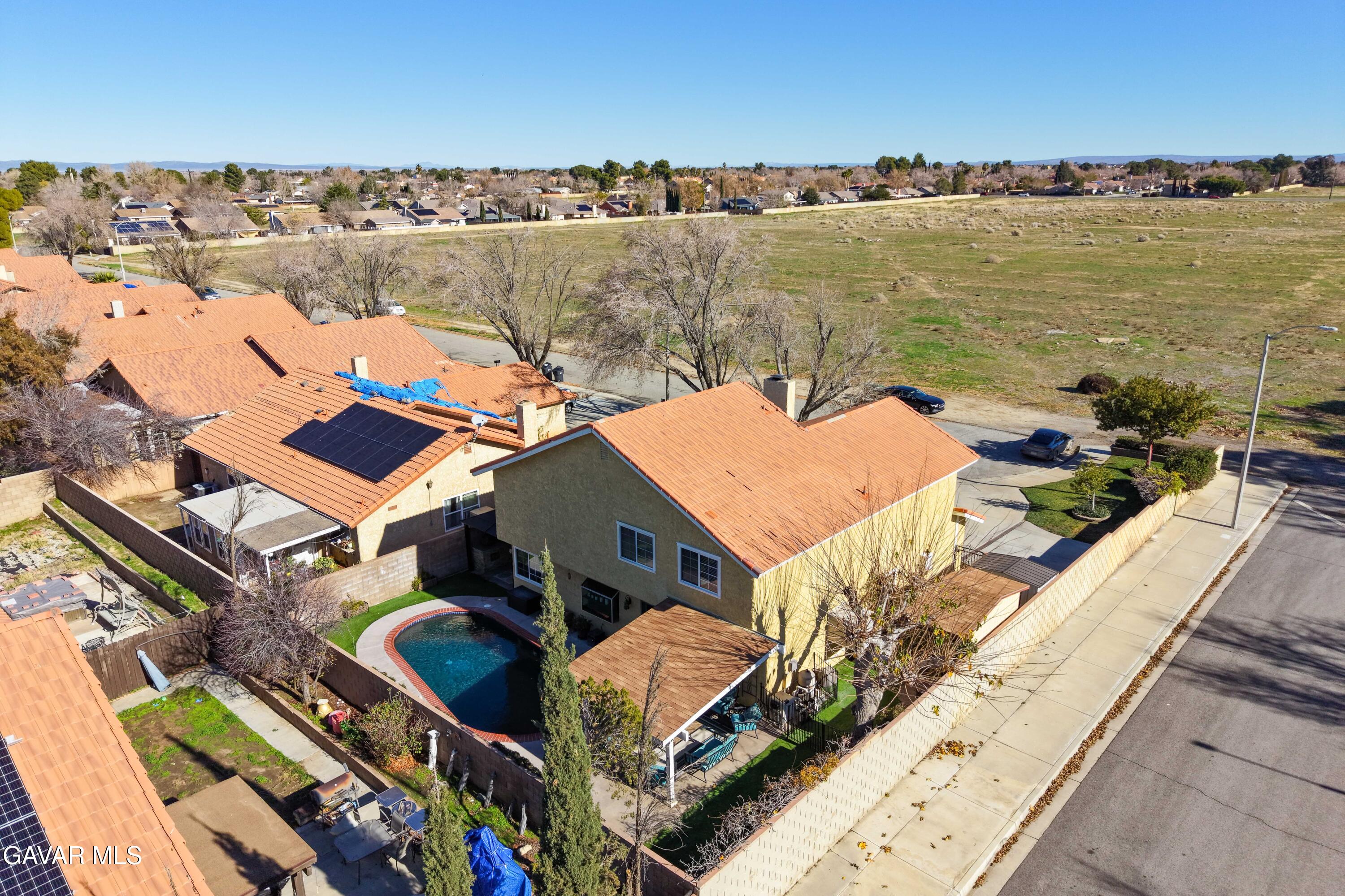 44003 7th Street East Lancaster, CA 93535 - Photo 60 of 62 an aerial view of a house with a ocean view