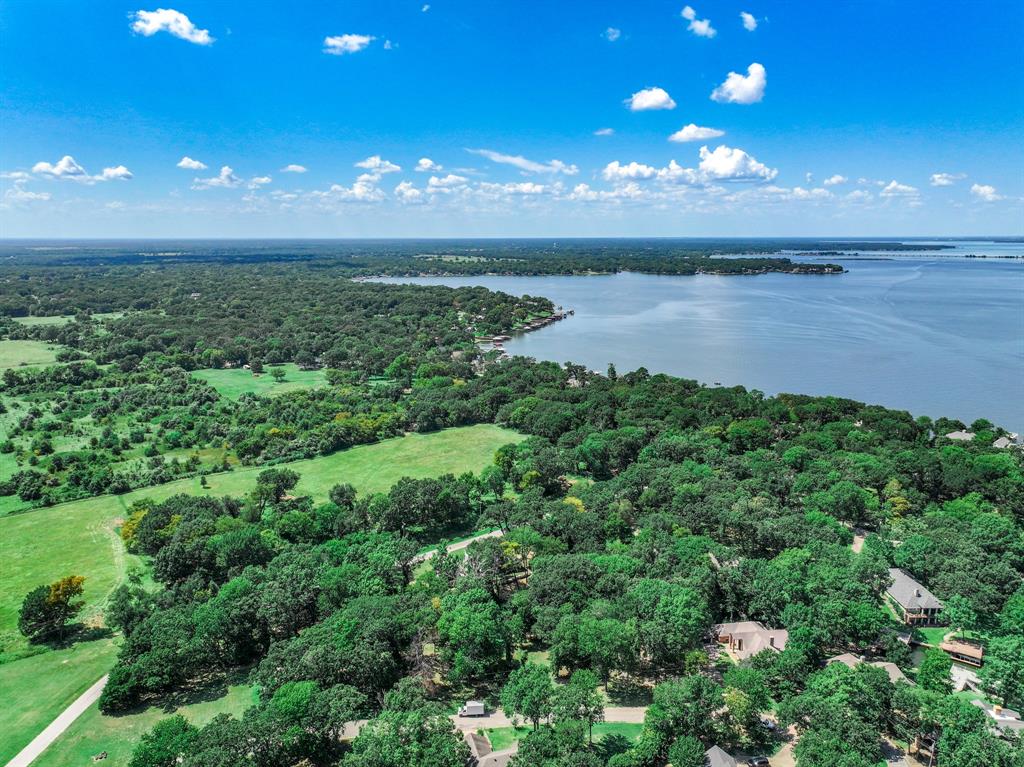 Tbd Inner Circle Tool, TX 75143 - Photo 18 of 24 Drone / aerial view of a forest and a large body of water