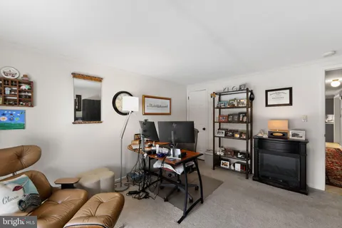 a room with furniture and workspace