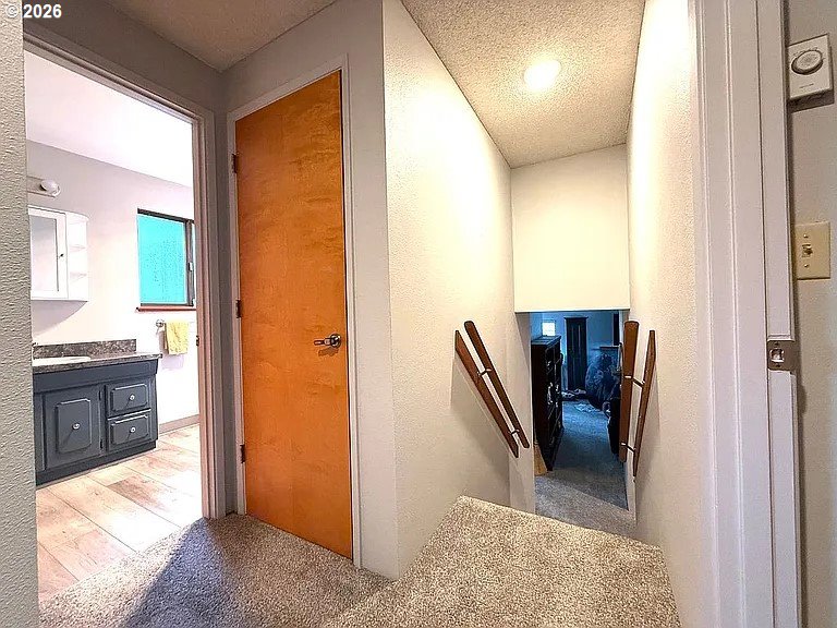 1005 Maple Street Myrtle Point, OR 97458 - Photo 19 of 32 a view of a hallway with bathroom and bathroom