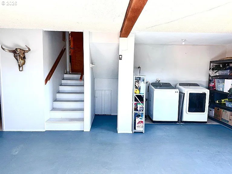 1005 Maple Street Myrtle Point, OR 97458 - Photo 22 of 32 a view of storage and utility room with stairs