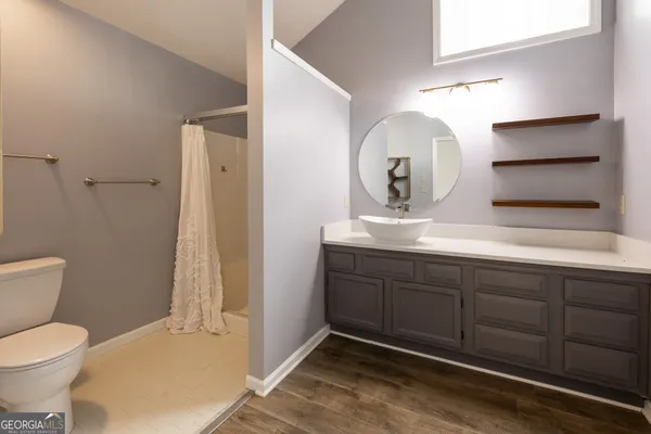a kitchen with stainless steel appliances granite countertop a stove top oven a sink and dishwasher