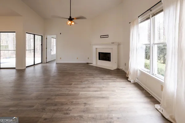 a view of kitchen and wooden floor