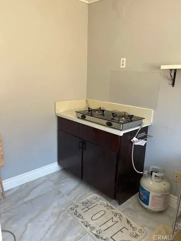 a room with a sink and a mirror