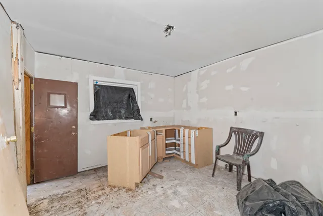 a room with furniture and a window