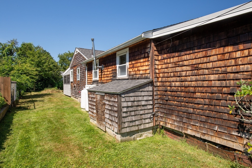 9 Morrison Way Lakeville, MA 02347 - Photo 22 of 28 a backyard of a house with lots of green space