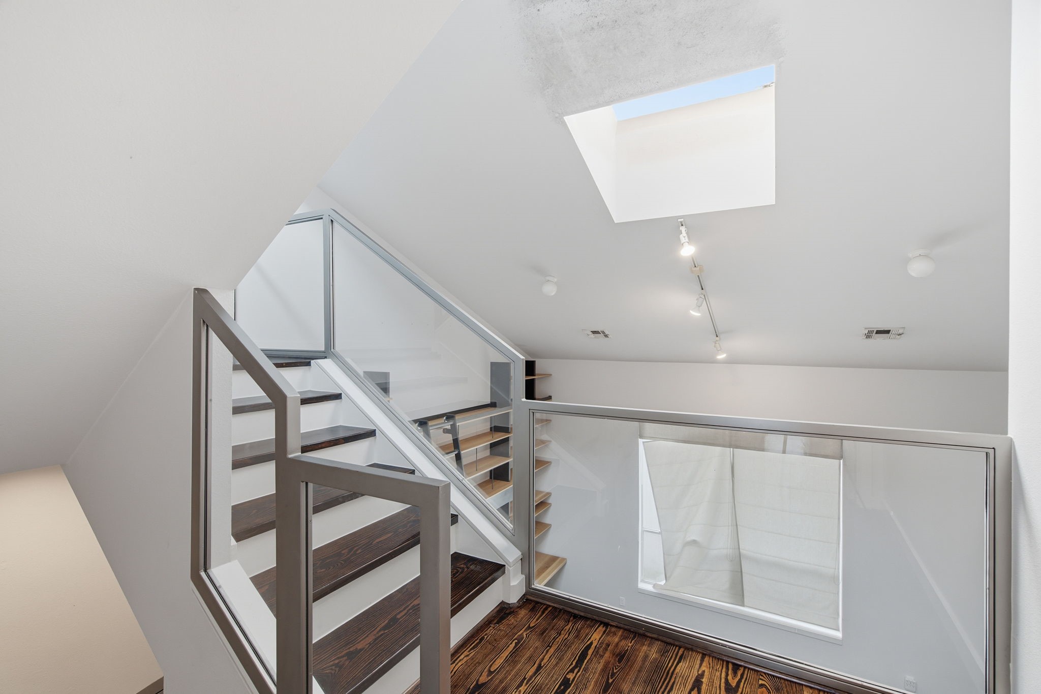 2934 Commerce Street Houston, TX 77003 - Photo 24 of 44 a view of entryway with wooden floor