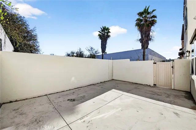 a view of a black white bed