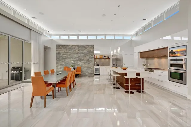 a view of a dining room with furniture window and outside view