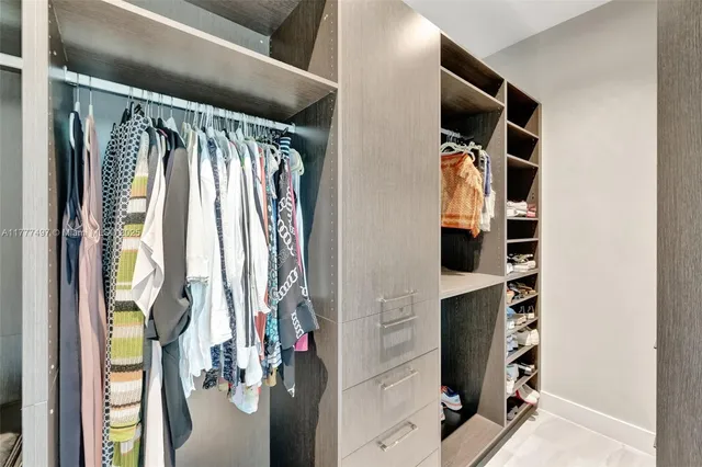 a room with gym equipment and windows