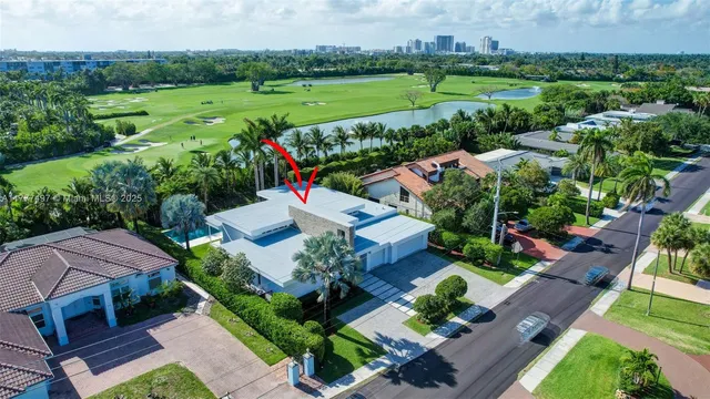 an aerial view of a house with outdoor space