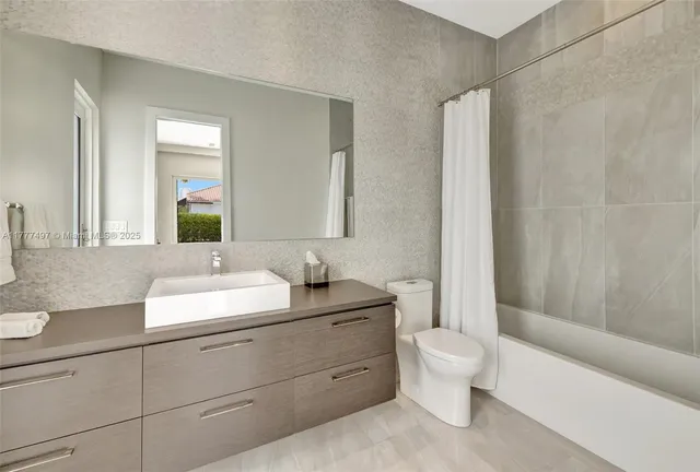 a view of a patio with a yard