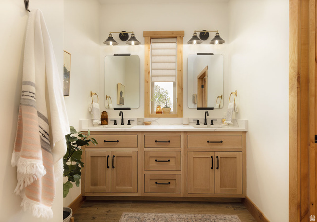382 Ridgeview Street, Unit 8 & 9 Brian Head, UT 84719 - Photo 25 of 52 Dual vanity with wood-finish cabinetry, white countertop, and integrated sinks
