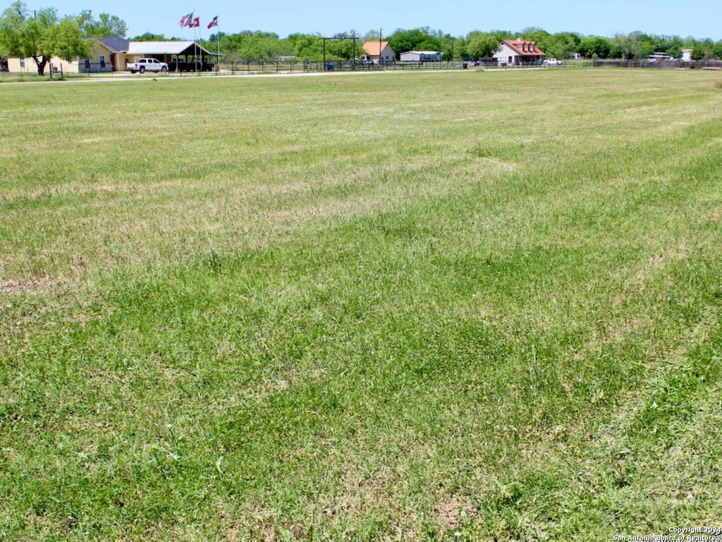 Lot 6 County Road 684 Lytle, TX 78052 - Photo 4 of 6 a view of a field with an outdoor space