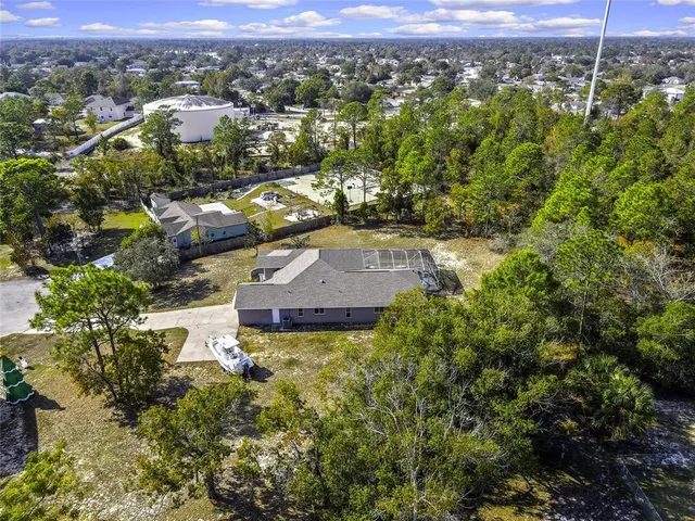 $470,000 | 12403 Centennial Street, Spring Hill, FL 34609