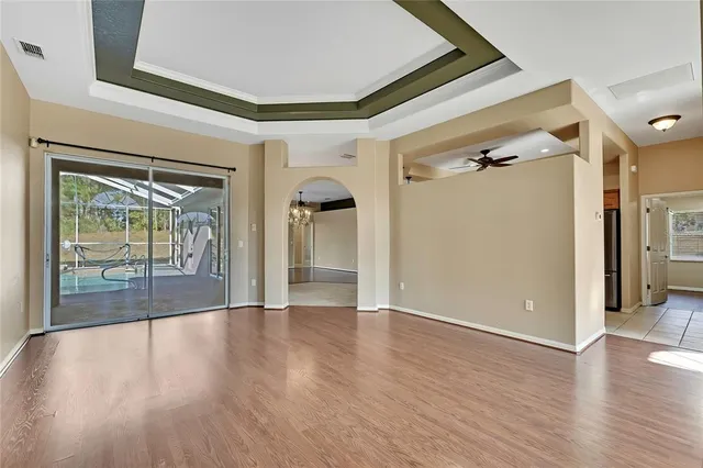 a view of an entryway with wooden floor