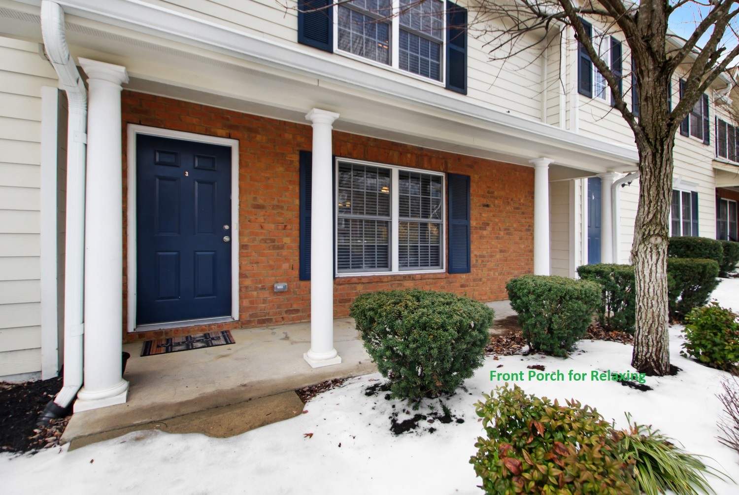 113 Cages Road, Unit 3 Hendersonville, TN 37075 - Photo 2 of 30 front view of a brick house with potted plants
